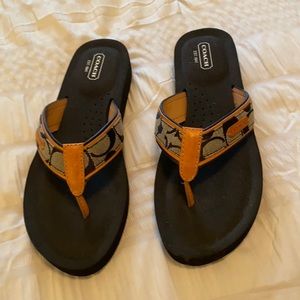 Coach Juanita flip flops size 9.